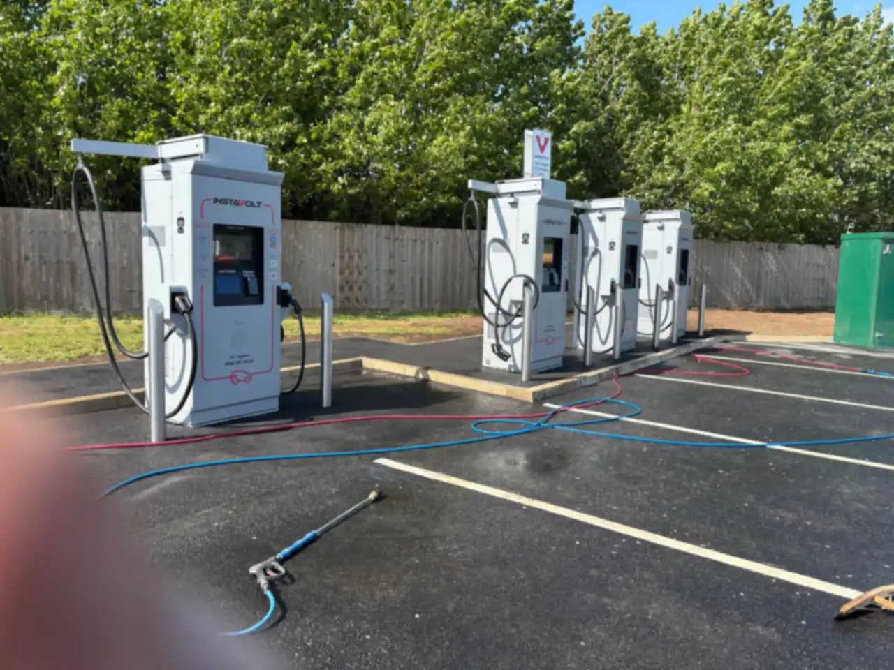A bank of EV chargers on a car park Jet Clean has cleaned
